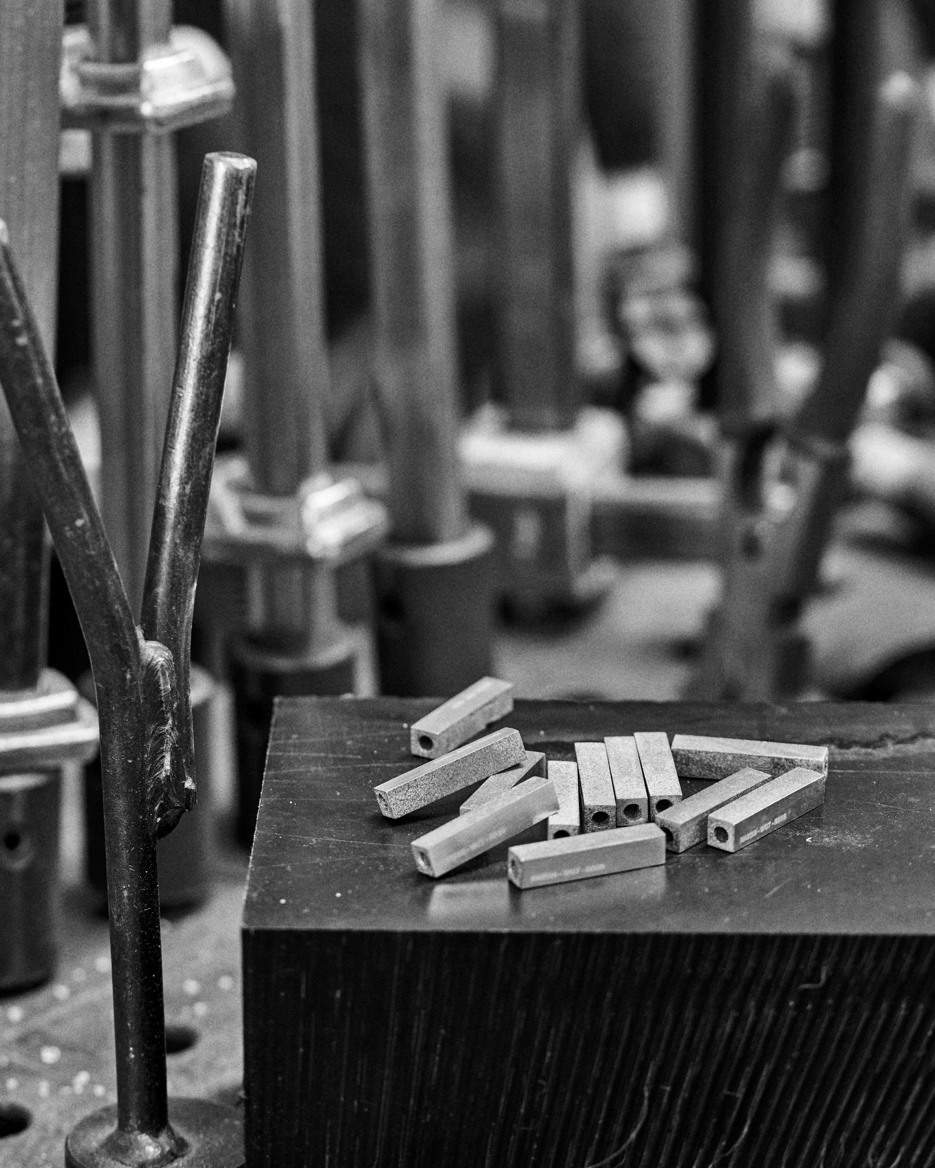 Black & White image of raw RESS Jewellery blocks which are made from F1 Cars in the RESS Factory.