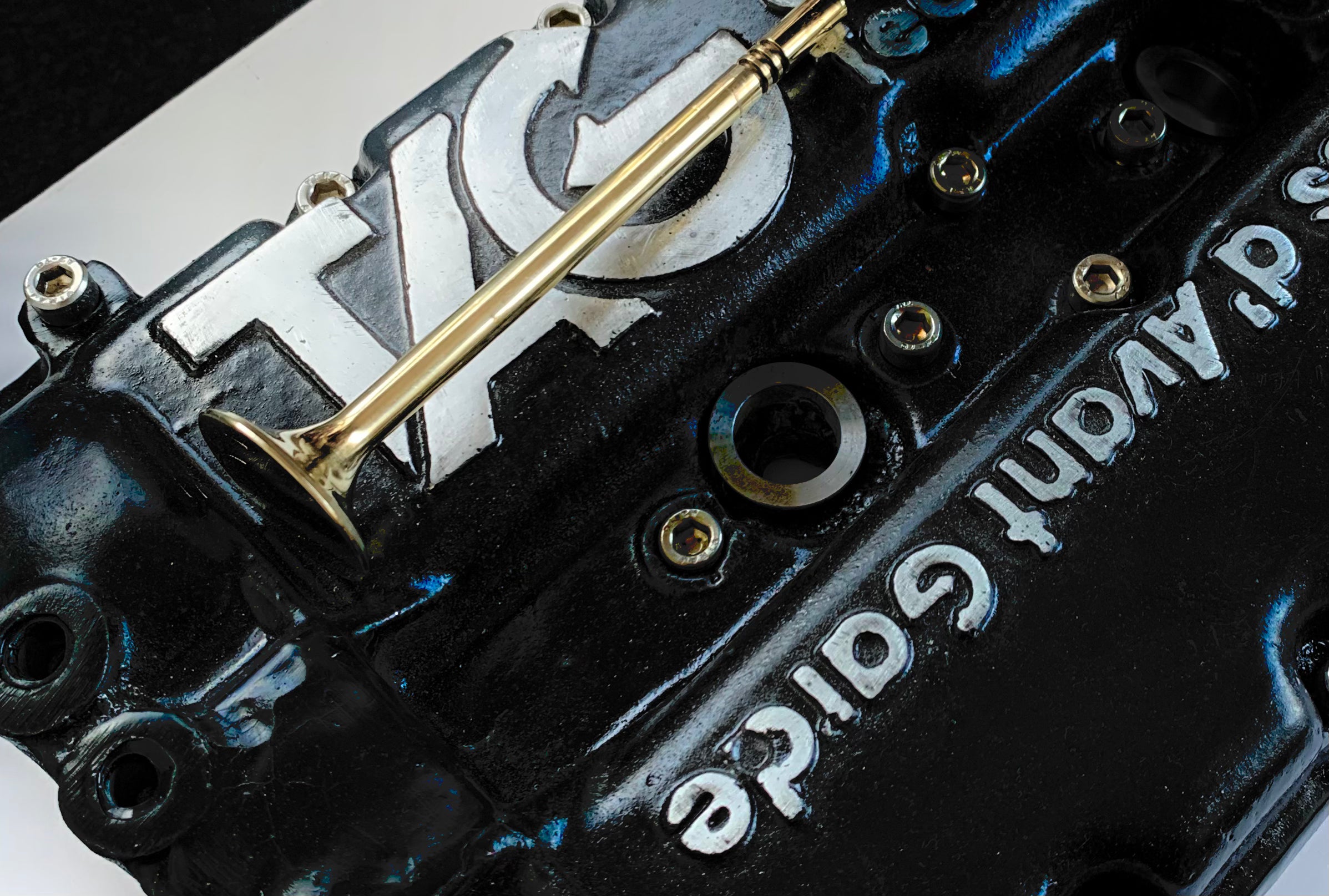 TAG McLaren F1 Engine from the McLaren 1980s F1 Car. With a value from the engine plated in gold on top