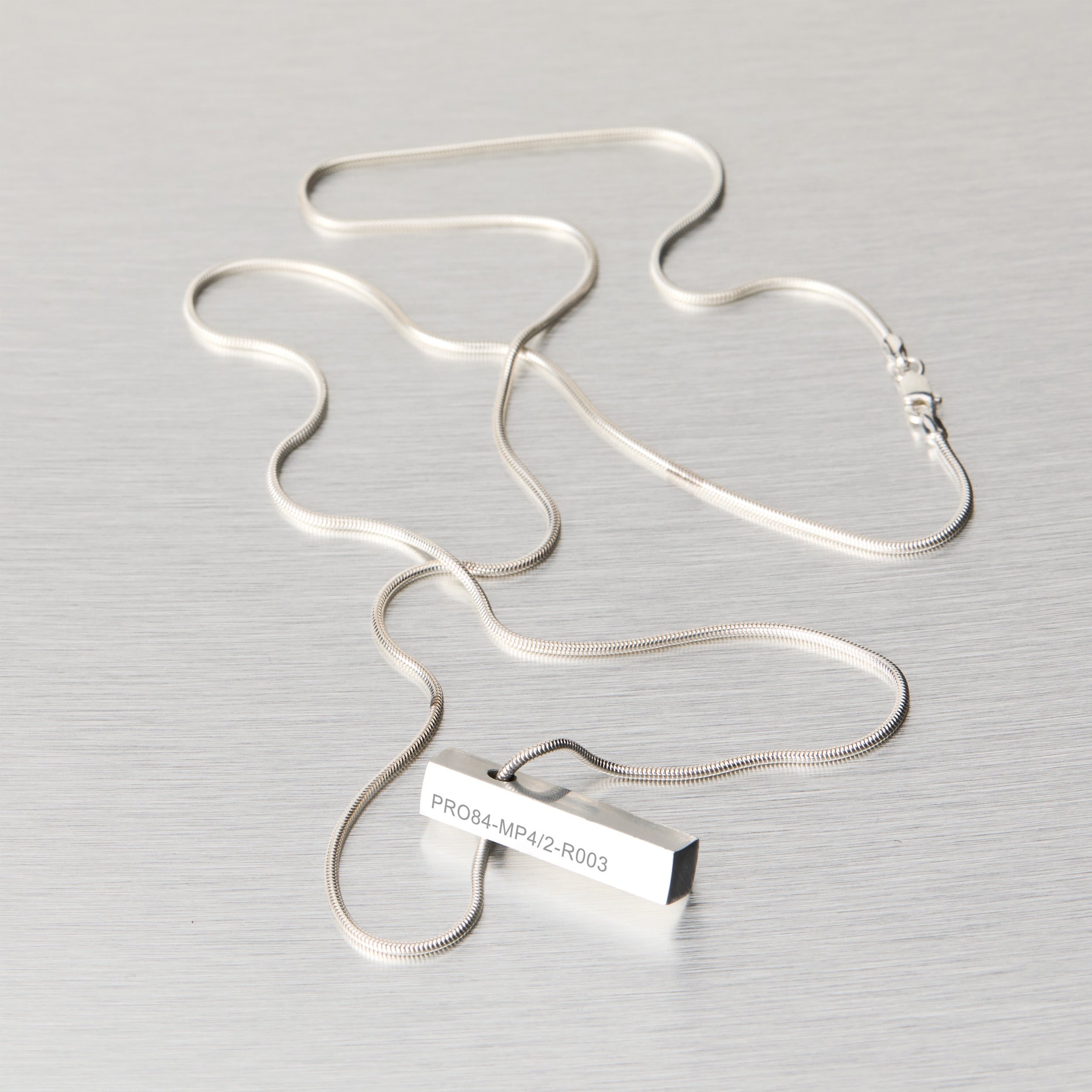 PRO84 - 1984 Championship Winners Engine Necklace