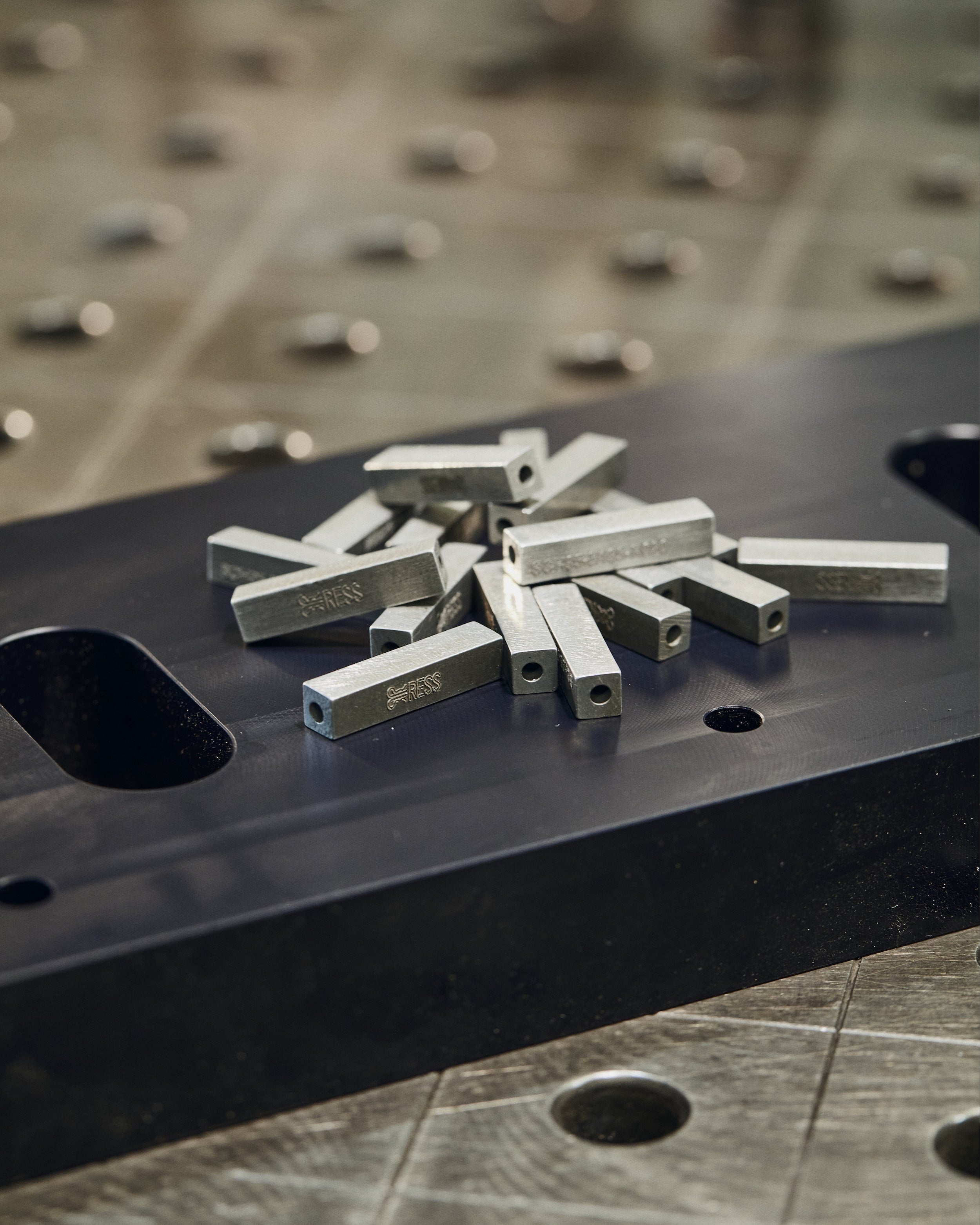 A group of RESS Jewellery Signature Blocks on the engineering table at the RESS factory about to be polished.