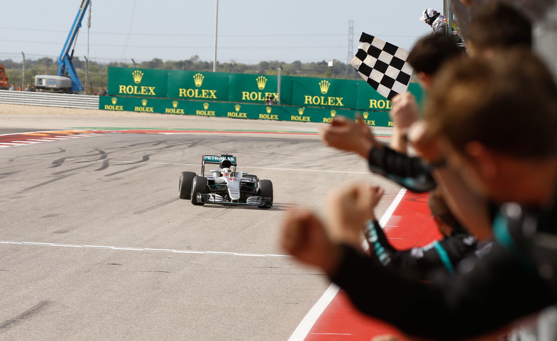 Lewis Hamilton 2016 Mercedes crossing the finishing line at COTA America Texas F1 Circuit during the Grand Prix.