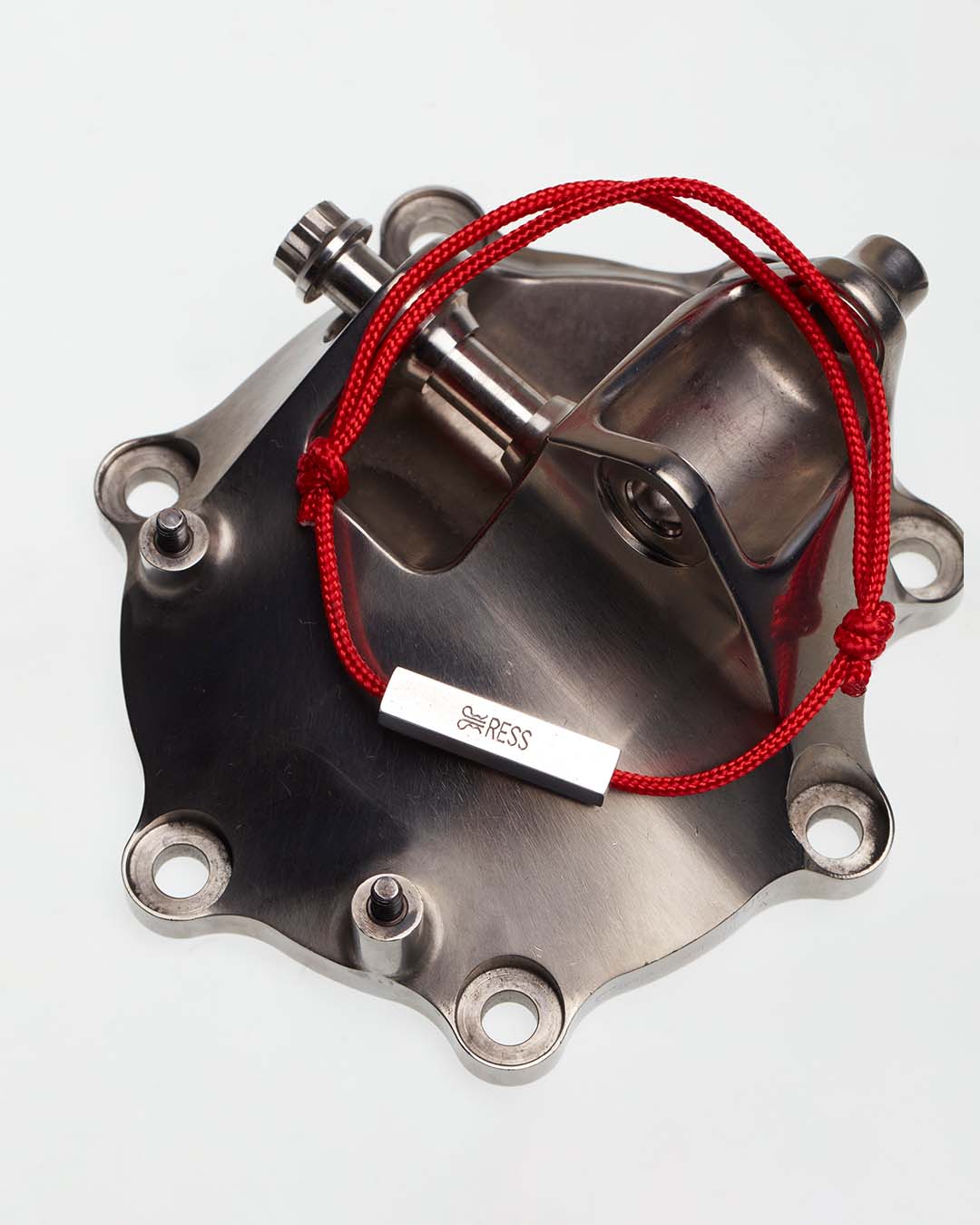 Raced Formula One Part with Red RESS jewellery bracelet. Made from Michael Schumacher's F1 Car